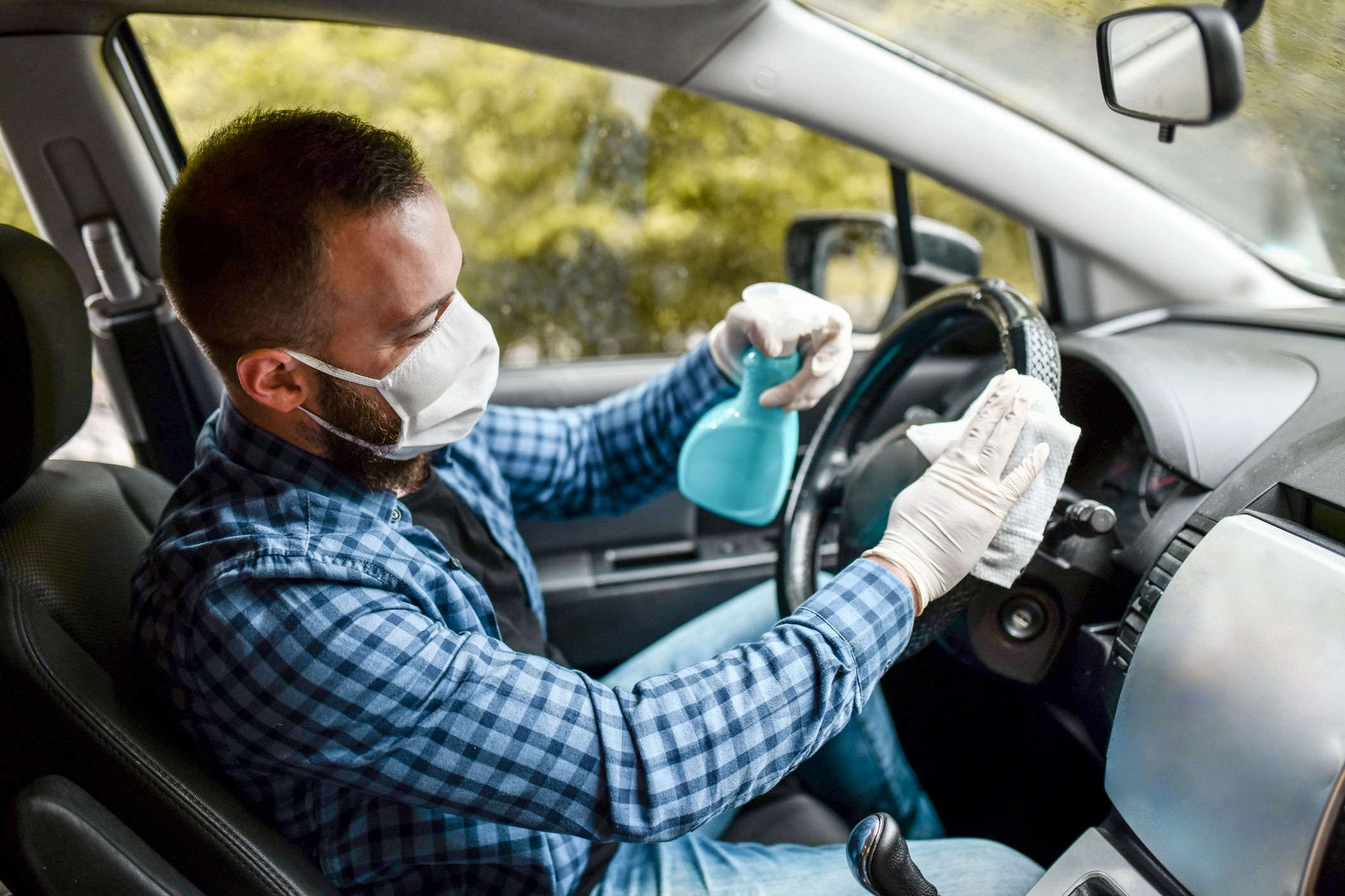 Cleaning and disinfecting a steering wheel during interior detailing